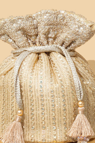 Gold yari embroidered base potli