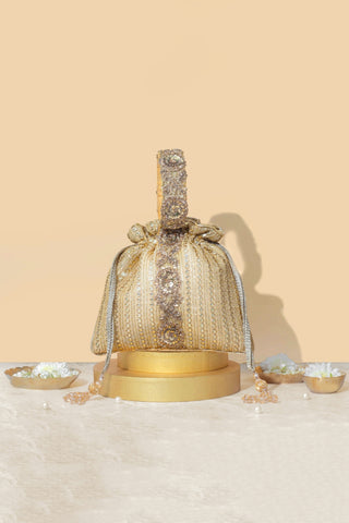 Gold yari embroidered potli