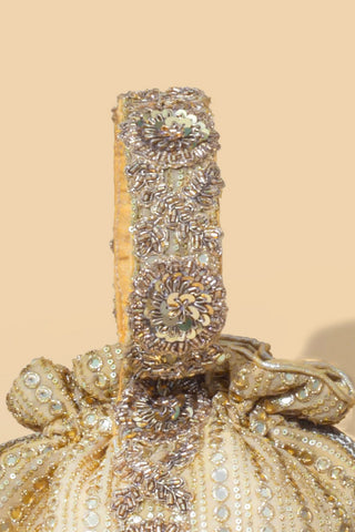 Gold yari embroidered potli