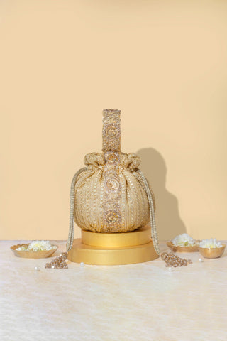 Gold yari embroidered round potli