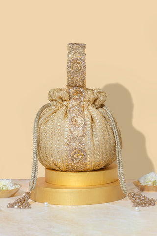 Gold yari embroidered round potli